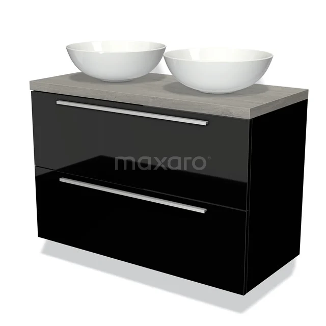 Zwart badkamermeubel met twee witte opzetwastafels, betonlook blad en metalen handgrepen, modern design.