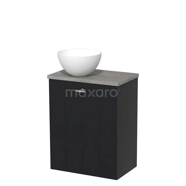 Zwart badkamermeubel met betonnen wastafelblad en witte ronde waskom, compact design voor moderne badkamers.