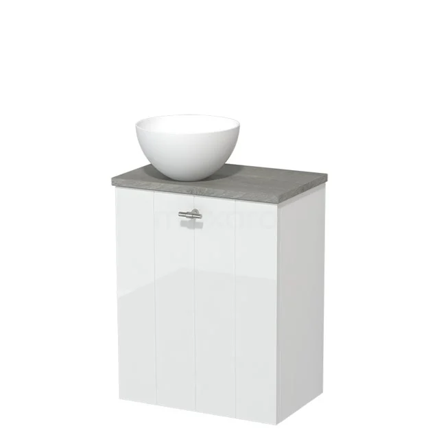 Witte badkamerkast met grijs blad en ronde wastafel, modern design, ideaal voor compacte badkamers.