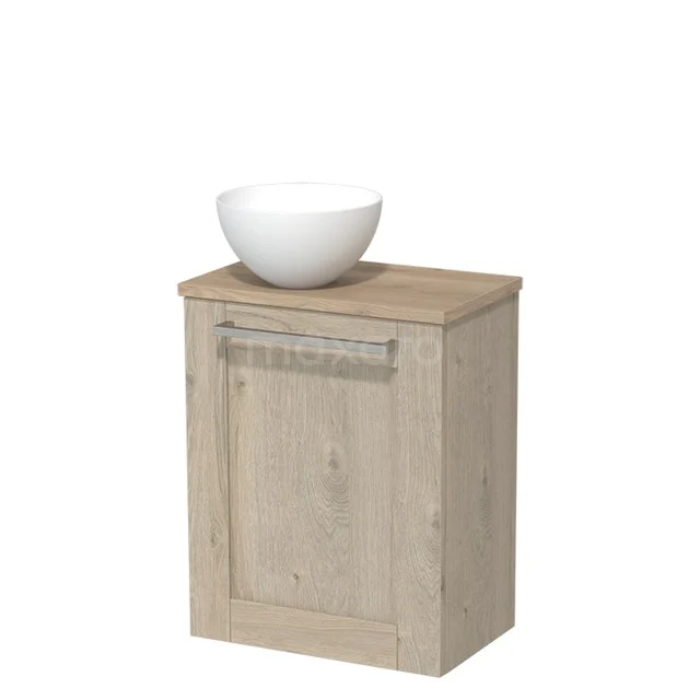 Houten badkamermeubel met handgreep in eikenlook, bovenblad met ronde witte waskom, compact ontwerp voor kleine badkamers.