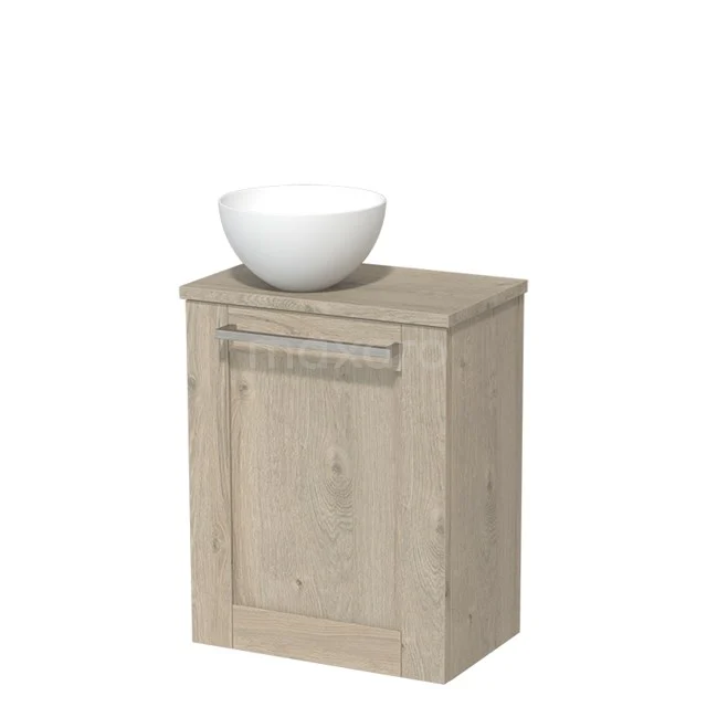 Houten badkamerkast met lade in licht eiken, voorzien van een witte opzetwaskom. Compact design voor moderne badkamers.