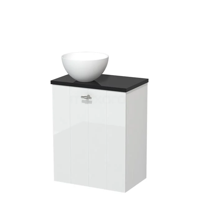 White bathroom unit with black top plate and round countertop wash basin, modern design from premium ceramic series.