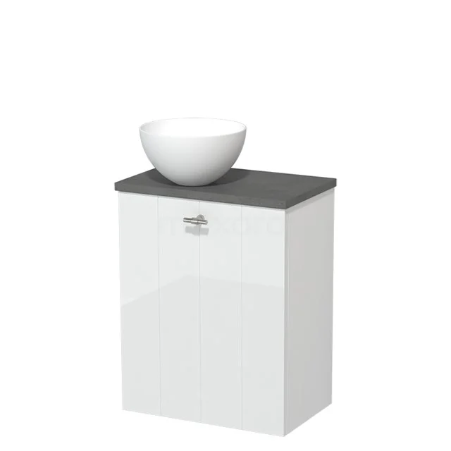 Wit badkamermeubel met grijze bovenkant en ronde, witte wastafelkom, modern design, geschikt voor compacte badkamers.