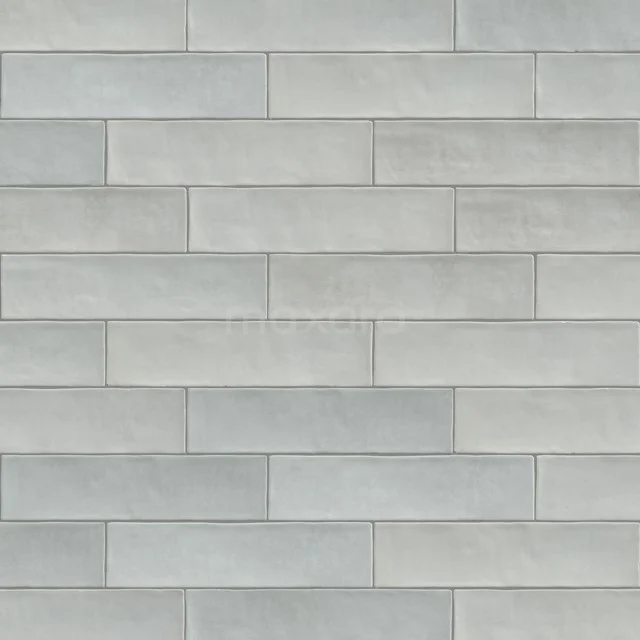 Hellgraue rechteckige Badezimmerfliesen mit matter Oberfläche, keramisches Material, ideal für einen modernen Badezimmerstil.