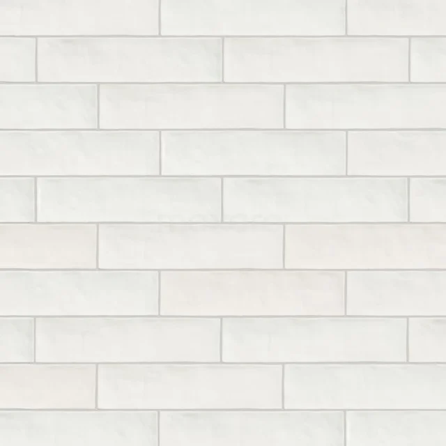 Colora Wall tile | 6,2x25cm Uni White Shiny 401-060101 White ceramic bathroom tiles in rectangular metro design, ideal for a modern and sleek wall finish.