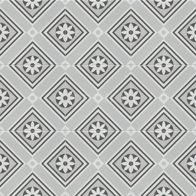 Grey ceramic bathroom tile with ornate black and white geometric pattern and star details, suitable for wall or floor.
