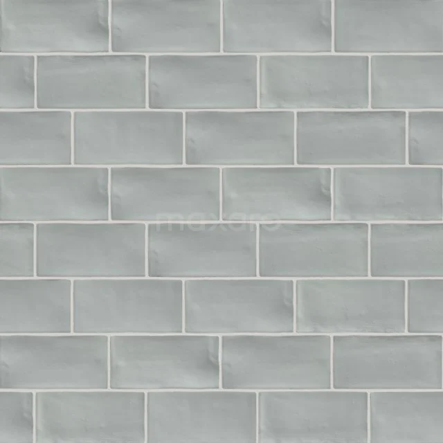 Light grey bathroom tile with glossy finish, subway style and rectangular format for a modern look.