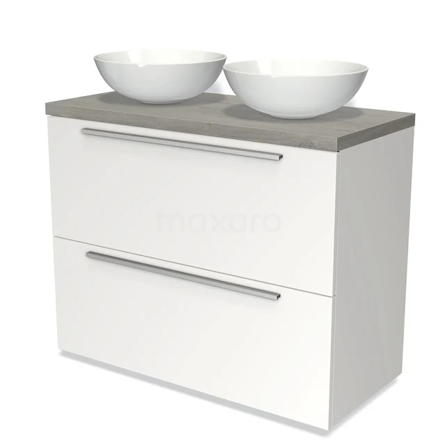 Weiße Badmöbel mit grauer Platte, doppelten keramischen Aufsatzwaschbecken und modernen Metallhaltegriffen.