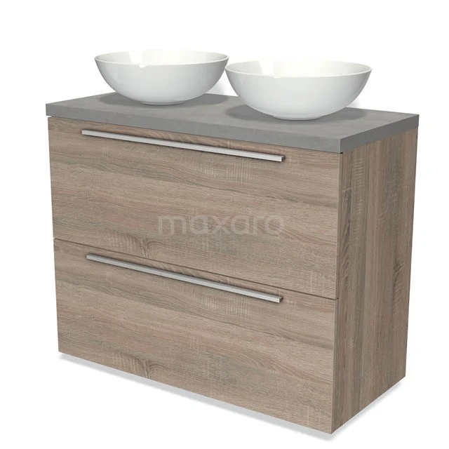 Badmöbel für Aufsatzwaschbecken 100cm Modulo Plato Eiche 2 hohe Schubladen Flach hellgrauer Beton Platte BMK13-00713 Badezimmermöbel Holzoptik mit zwei weißen Aufsatzwaschbecken, grauer Platte und metallischen Griffen; modernes Design für ein stilvolles Badezimmer.