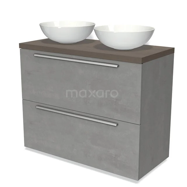 Graue Badmöbelset mit Betonlook, zwei weißen Aufsatzwaschbecken und einer holzfarbigen Platte für einen modernen Badezimmerstil.