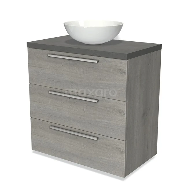 Grey wooden bathroom unit with three drawers, dark worktop and white ceramic countertop wash basin, modern and stylish design.