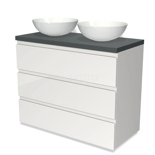 Weißer Badschrank mit drei Schubladen, anthrazitfarbener Waschtischplatte und zwei runden Aufsatzwaschbecken, modernes Design.