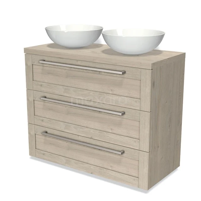 Wooden bathroom cabinet with three drawers and double white countertop wash basins, sleek design and metal handles for a modern look.