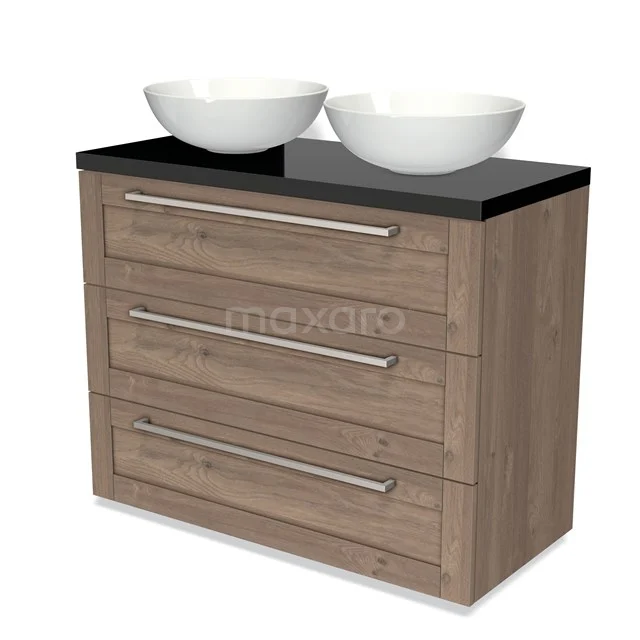 Oak bathroom unit with three drawers, black worktop and double white countertop wash basins.