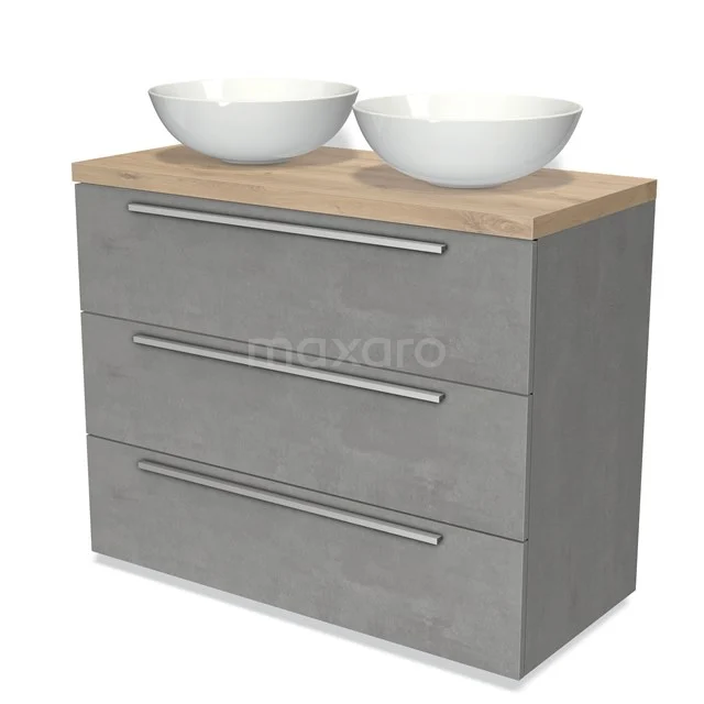 Graues Badezimmermöbel mit Betonlook, holzfarbener Platte und zwei weißen Waschbecken; modernes Design mit drei Schubladen.