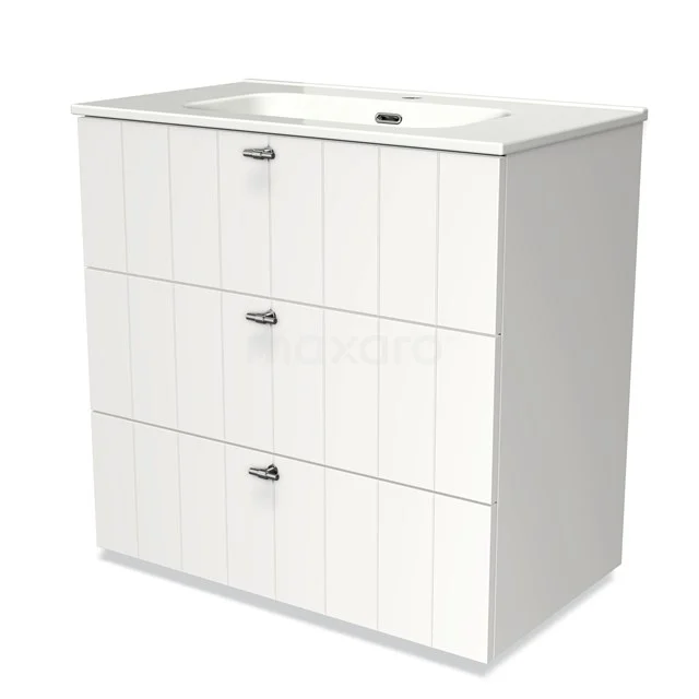 Weißes Badezimmermöbel mit drei Rillenmuster-Schubladen, keramischem Waschbecken und silbernen Haltegriffen; stilvoll und funktional.
