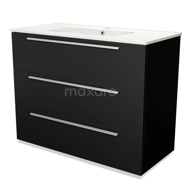 Zwart wastafelmeubel met drie lades, strakke metalen handgrepen en keramische wastafel, ideaal voor moderne badkamers.