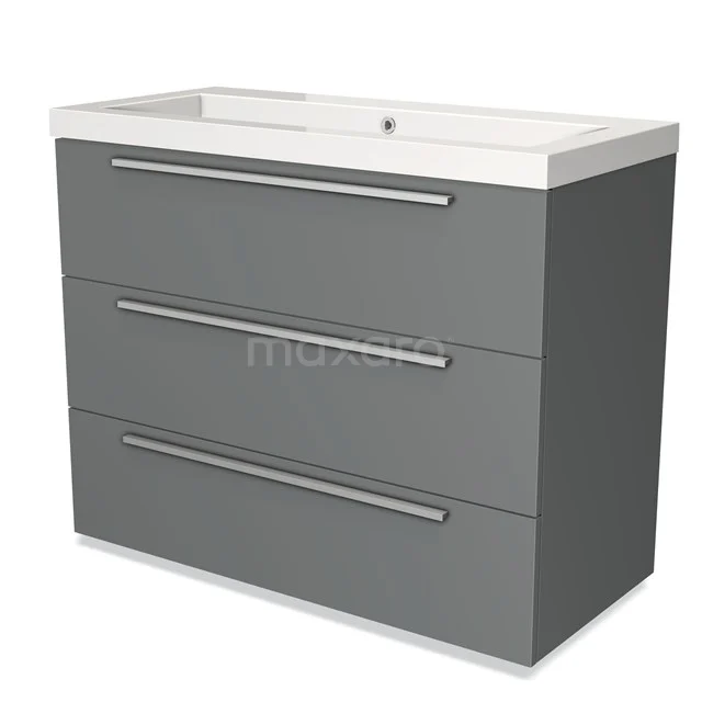 Grijze badkamerkast met drie lades en geïntegreerde witte wastafel, strak design en aluminium handgrepen.