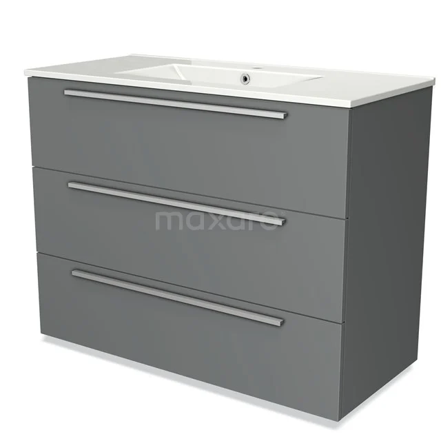 Grijze badkamermeubelset met drie lades, strakke metalen handgrepen en een geïntegreerde witte wastafel, modern design.