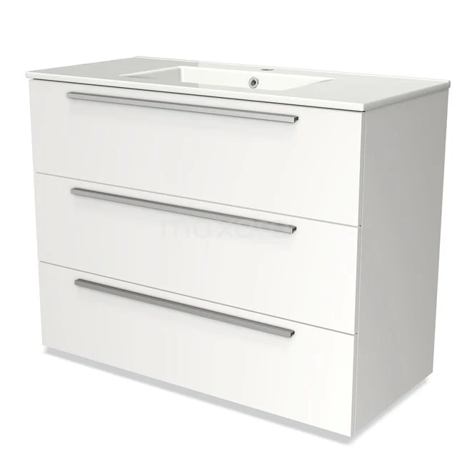 White bathroom unit with integrated vanity units with basin, modern design, and three spacious drawers with silver handles.