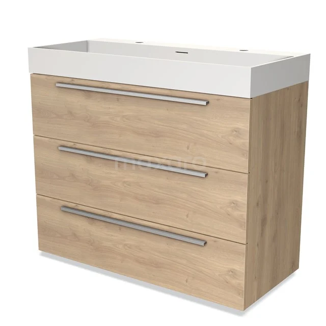 Wooden vanity unit with white sink, three drawers and metal handles; a stylish bathroom unit for modern bathrooms.