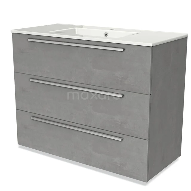 Grey vanity unit with concrete look, three drawers and integrated white sink; stylish storage for the modern bathroom.