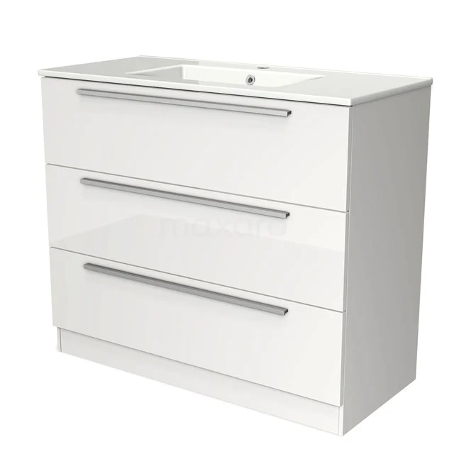 Witte badkamermeubel met drie lades en geïntegreerde wastafel, strak design met metalen handgrepen.
