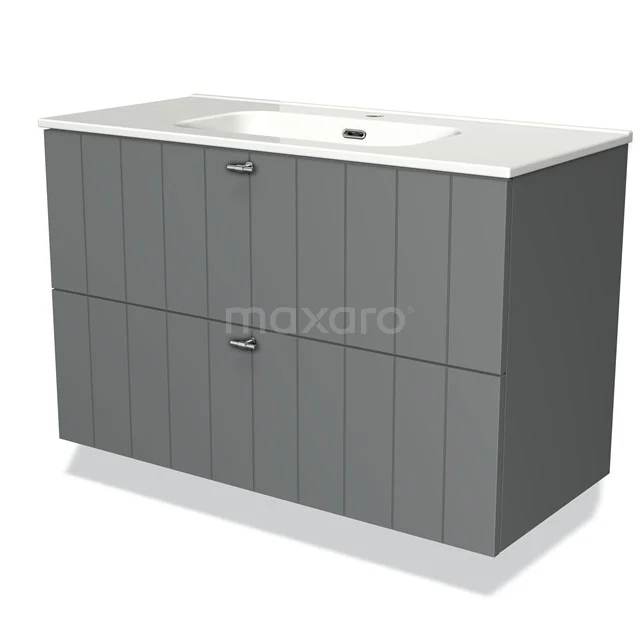 Grey bathroom furniture set with vertical lines, two wide drawers and built-in basin; modern and practical design.