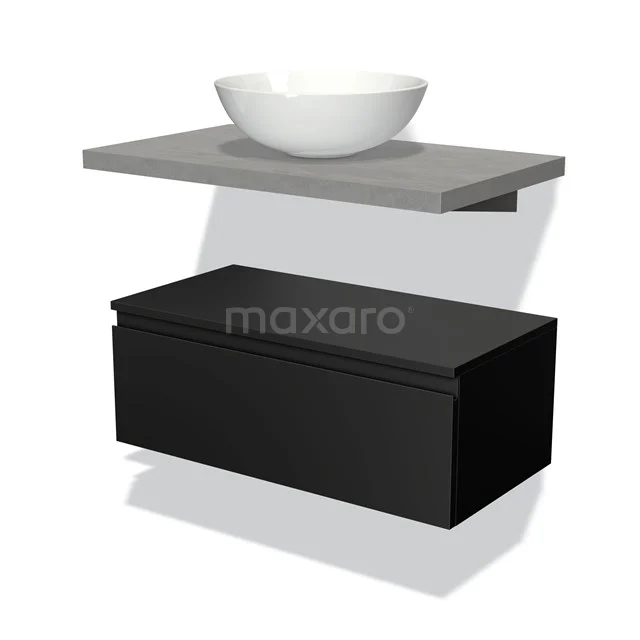 Modern bathroom unit with black chest of drawers, grey wall top and white round basin, ideal for a minimalist bathroom design.