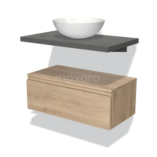Wooden bathroom unit with drawers, grey shelf and white ceramic countertop wash basin; modern design with natural wood finish.