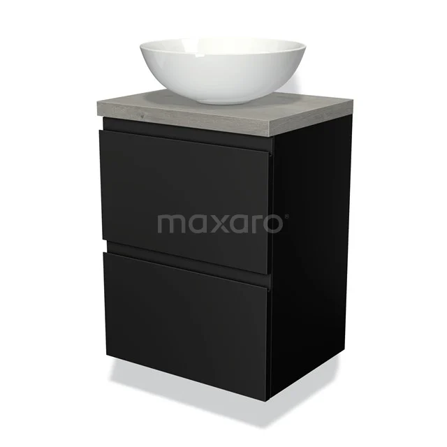 Schwarzes Badmöbel mit matter Oberfläche, Betonplatte und weißer Waschbecken, kompakte Designlösung für moderne Bäder.