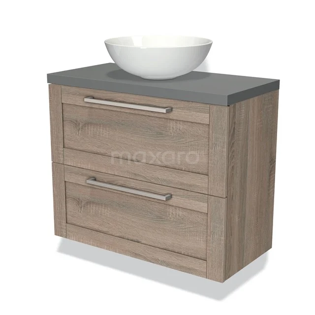 Houten badkamermeubel met keramische waskom, grijze bovenblad, twee lades met metalen handgrepen, moderne stijl.
