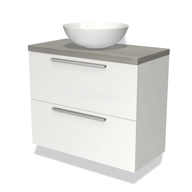 Weißes Badezimmermöbel mit grauer Waschtischplatte, keramischem runden Aufsatzwaschbecken und zwei Schubladen mit metallenen Haltegriffen.