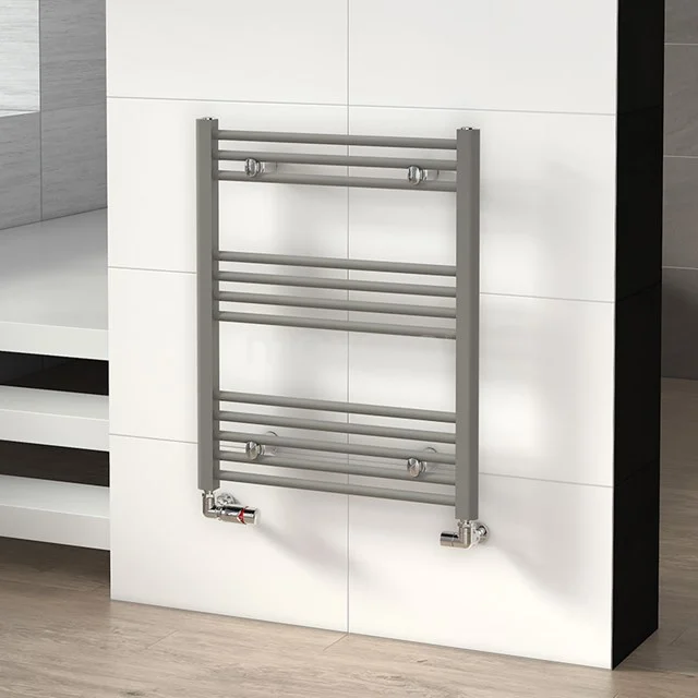 Grey metal towel radiator with horizontal tubes, ideal for a modern bathroom, wall-mounted.
