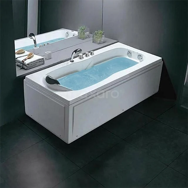 Rechteckige weiße Badewanne mit Wasserstrahl, integrierter Armlehne und modernem Finish, perfekt für ein stilvolles Badezimmer.