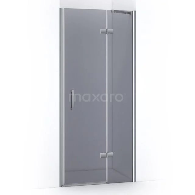 Shower door made of clear glass with silver profile, including hinges and Handle; perfect for modern bathroom style.