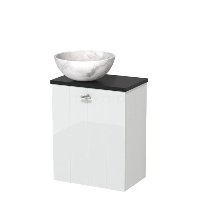 Wit badkamermeubel met zwarte blad en ronde wastafel van marmerlook, compact ontwerp geschikt voor moderne badkamers.