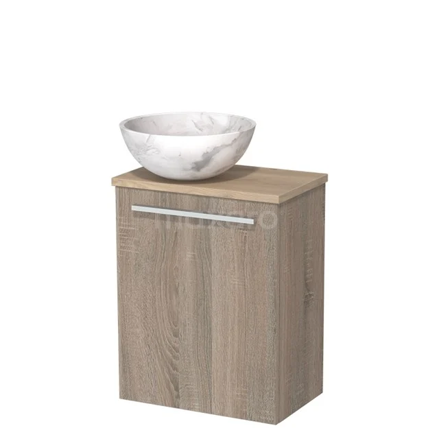 Compacte badkamerkast licht eiken met keramische wastafel, modern design en metalen handgreep.