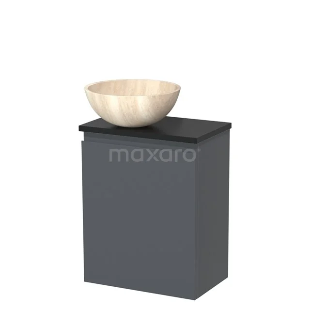 Grijze badkamerkast met zwarte bovenplaat en een ronde beige waskom van natuursteen, ideaal voor een moderne badkamer.