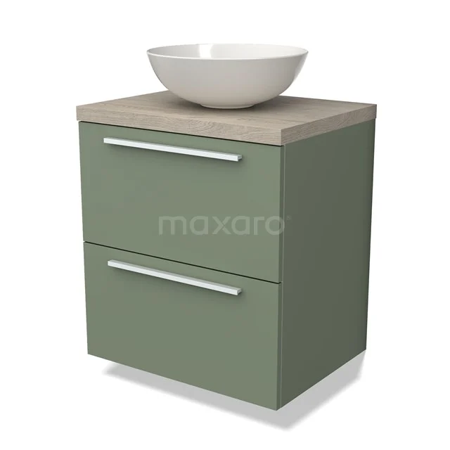 Groene hangende badkamermeubelset met twee lades, houten blad en witte komvormige wastafel van keramiek.