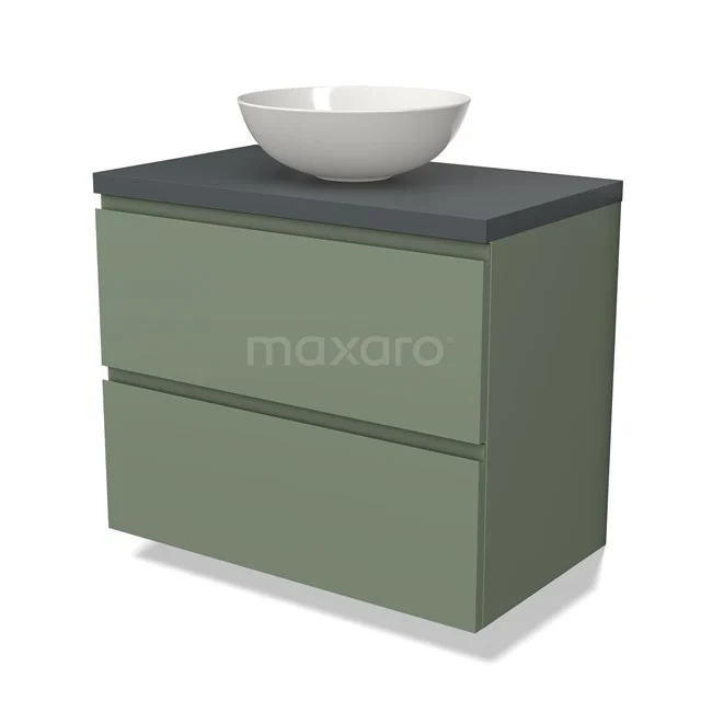 Groene badkamermeubelset met matte afwerking, antraciet blad en witte komvormige waskom, ideaal voor een moderne badkamer.