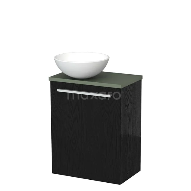 Zwart badkamermeubel met groene wastafel en witte opzetkom, modern design met chromen handgreep.