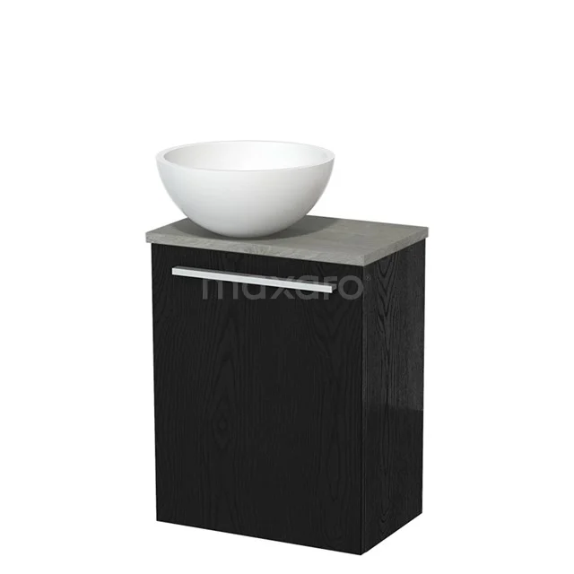 Zwart badkamermeubel met witte waskom, grijs stenen blad en strakke handgreep; compact design voor moderne badkamers.