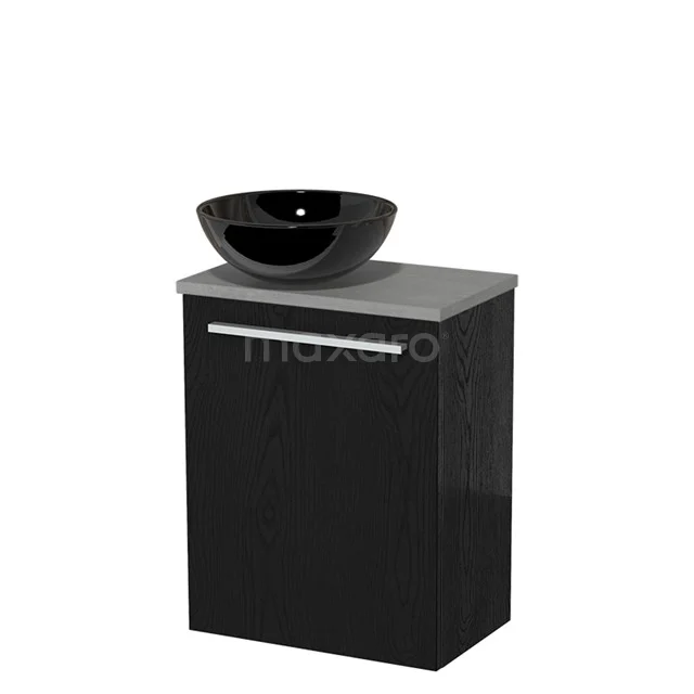 Zwarte badkamermeubelset met glanzend zwarte waskom, grijs blad en chroom greep, compact design ideaal voor moderne badkamers.