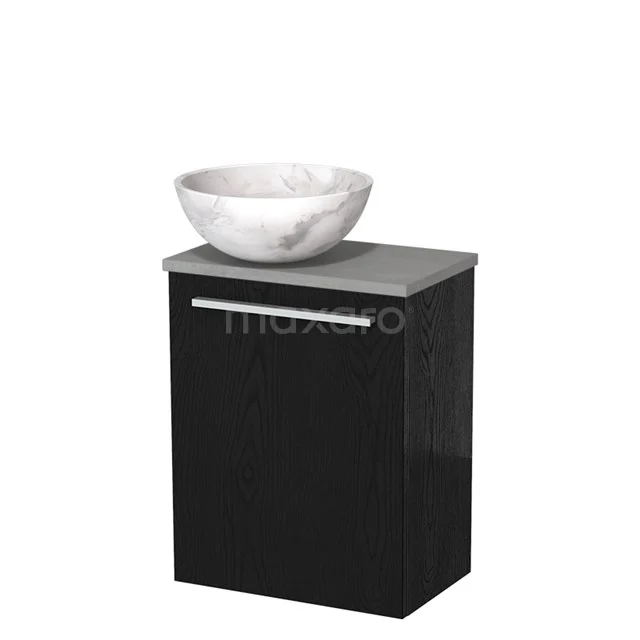 Zwart badkamermeubel met een grijs blad, enkele deur en een ronde, witte wastafel van marmer voor een moderne badkamerstijl.