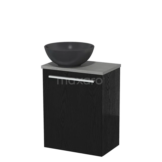 Zwart badkamermeubel met ronde zwarte waskom, grijze gemarmerde bovenblad, strak design en metalen handgreep.