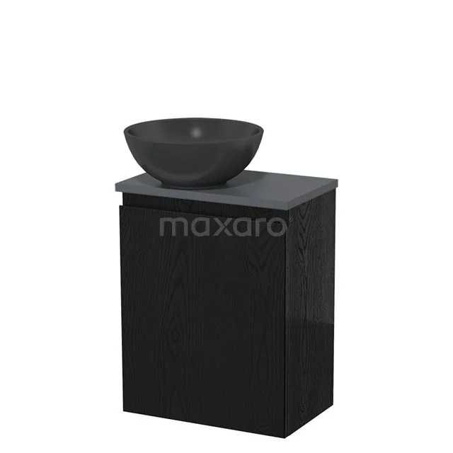 Zwarte badkamermeubelset met mat zwarte waskom en houten onderkast, ideaal voor een moderne badkamer inrichting.