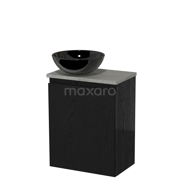 Zwart badkamermeubel met matzwarte wastafelkom en grijs betonnen blad, modern design voor een stijlvolle badkamerinrichting.
