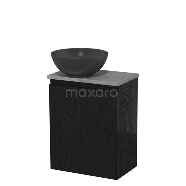 Zwart badkamermeubel met marmeren blad en grijze opbouwwastafel, ideaal voor moderne badkamers met beperkte ruimte.