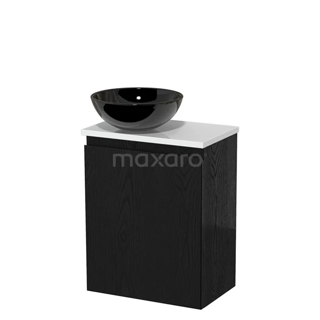 Zwarte badkameronderkast met witte bovenkant en een ronde zwarte waskom van keramiek, modern design voor compacte badkamers.